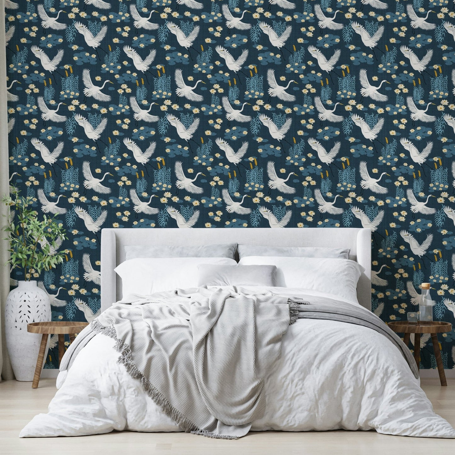 Nature-inspired blue wallpaper with heron motifs

