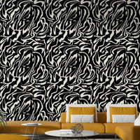 The wallpaper is used to create a feature wall in a dining room.


