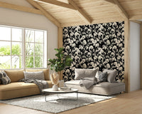 Light wood furniture and neutral textiles are in the room.
