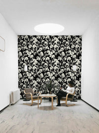 Various types of leaves and stems are scattered across the paper.
