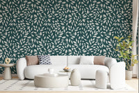 Cozy seating area balanced by White Vines on Teal Wallpaper and neutral decor