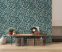 Living room interior enhanced by White Vines on Teal Wallpaper with dense leaf detail