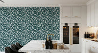 Kitchen setup paired with White Vines on Teal Wallpaper adding natural visual texture
