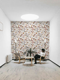 Natural beige wallpaper featuring wildflower art.

