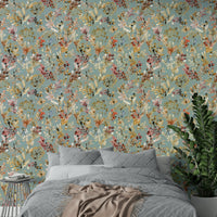 Elegant teal wallpaper featuring golden grass motifs.

