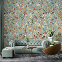Botanical wallpaper in teal with metallic gold details.

