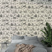 An angled shot of a wall with animal wallpaper

