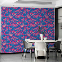 The image shows a full wall with a pattern of wild roses and leaves.

