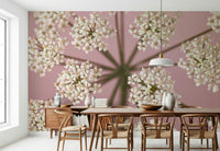 Wildflower Whispers Wall Mural in a nursery with light wooden furniture wallpaper.