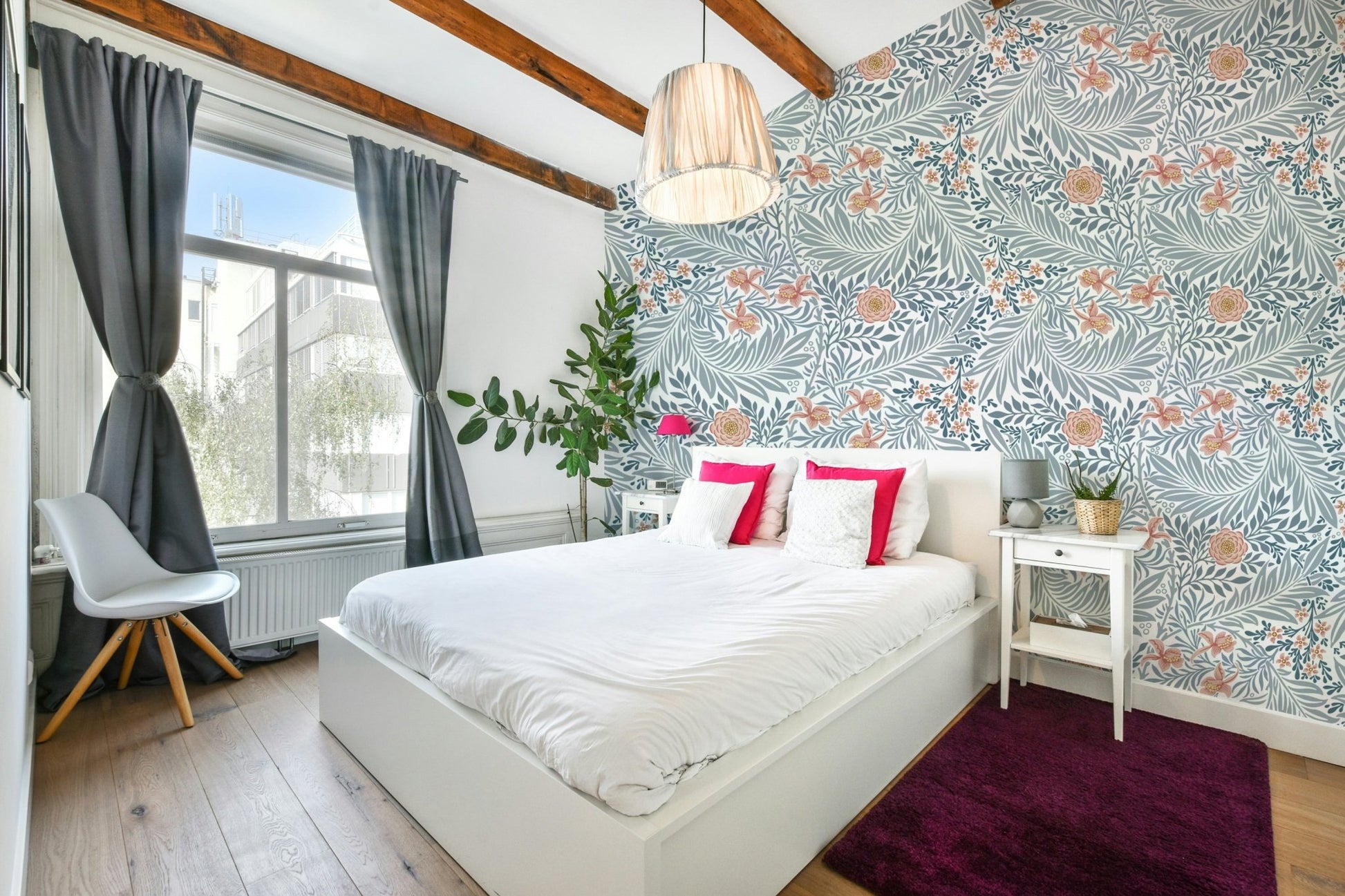 The image shows a repeating design with larkspur flowers and leaves.

