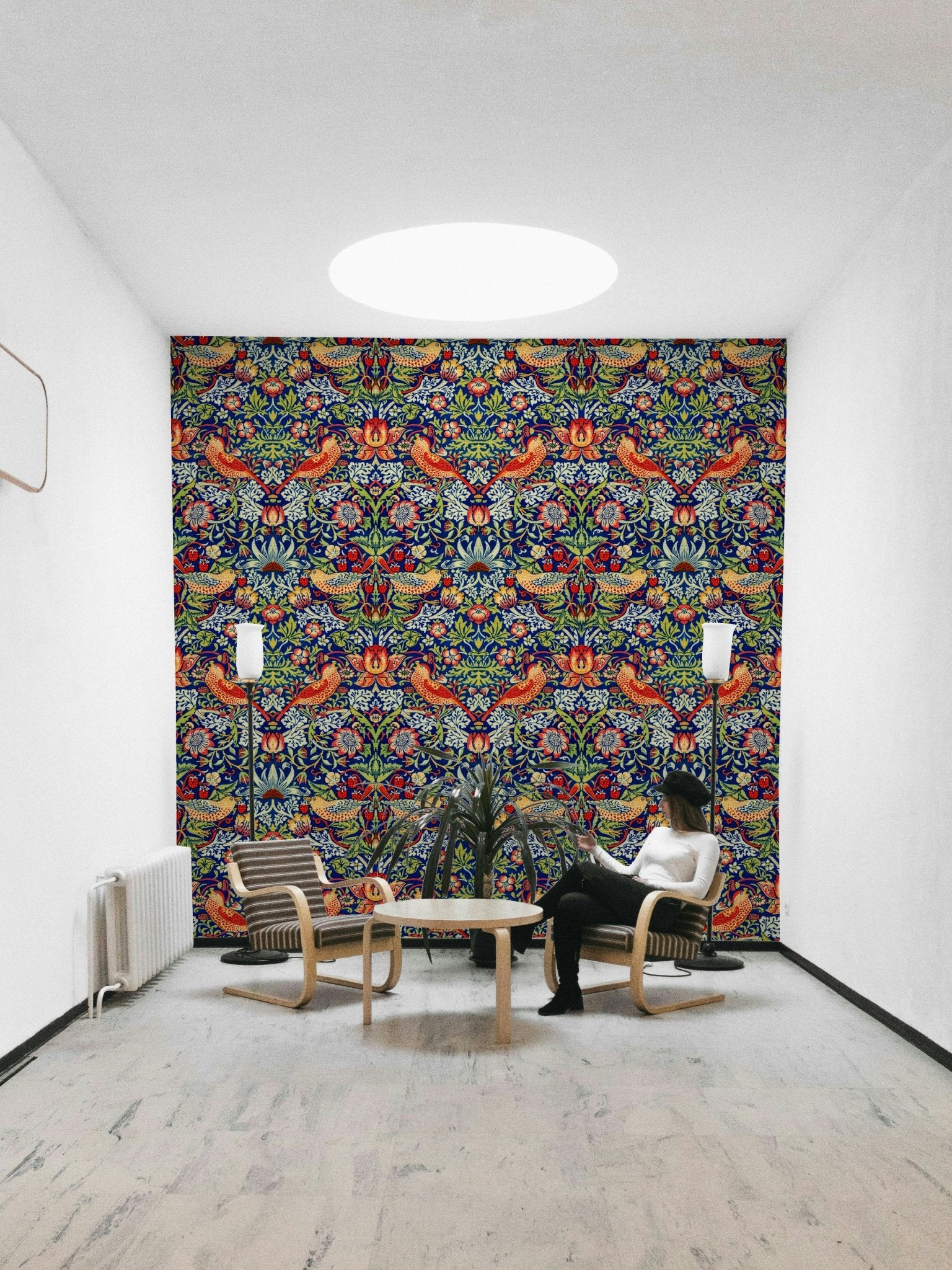 The wallpaper is installed in a formal, elegant living room.

