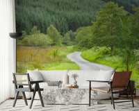 Curvy road leading through woodland on Winding Way Serenity Wall Mural.