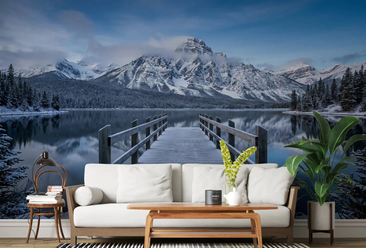 A living room opens up under Winter Lake Serenity wall mural with snowy peaks above.GD9541