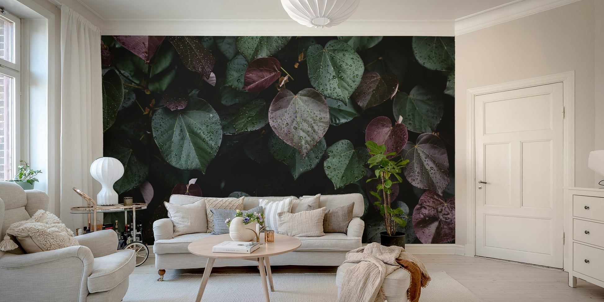 A graceful subtle leaf pattern wall mural in cool, white tones.

