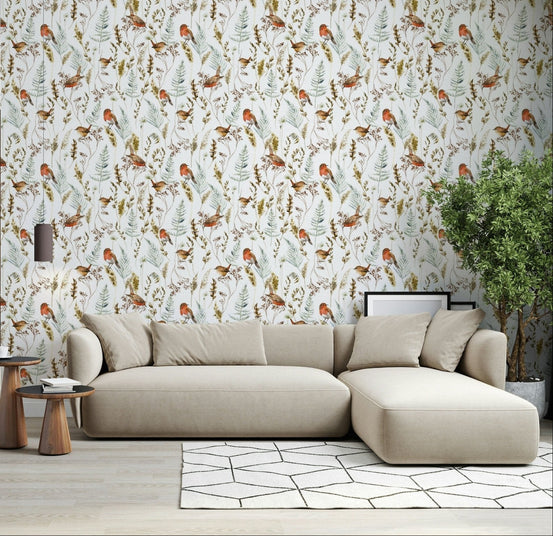 Red robins perched on frost-covered branches in a modern Indian living room., GD7347