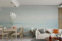 A peaceful open ocean mural on decorative wallpaper.

