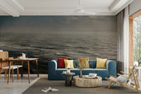 An artistic moody sea mural on minimalist wallpaper.

