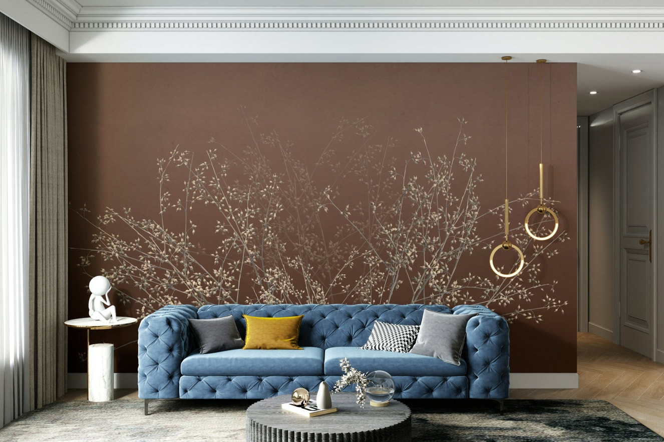 An elegant wall mural with a pattern of bare tree branches.

