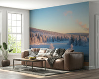 Winter's Light Cabin Wall Mural in a bright dining room with oak furniture wallpaper.