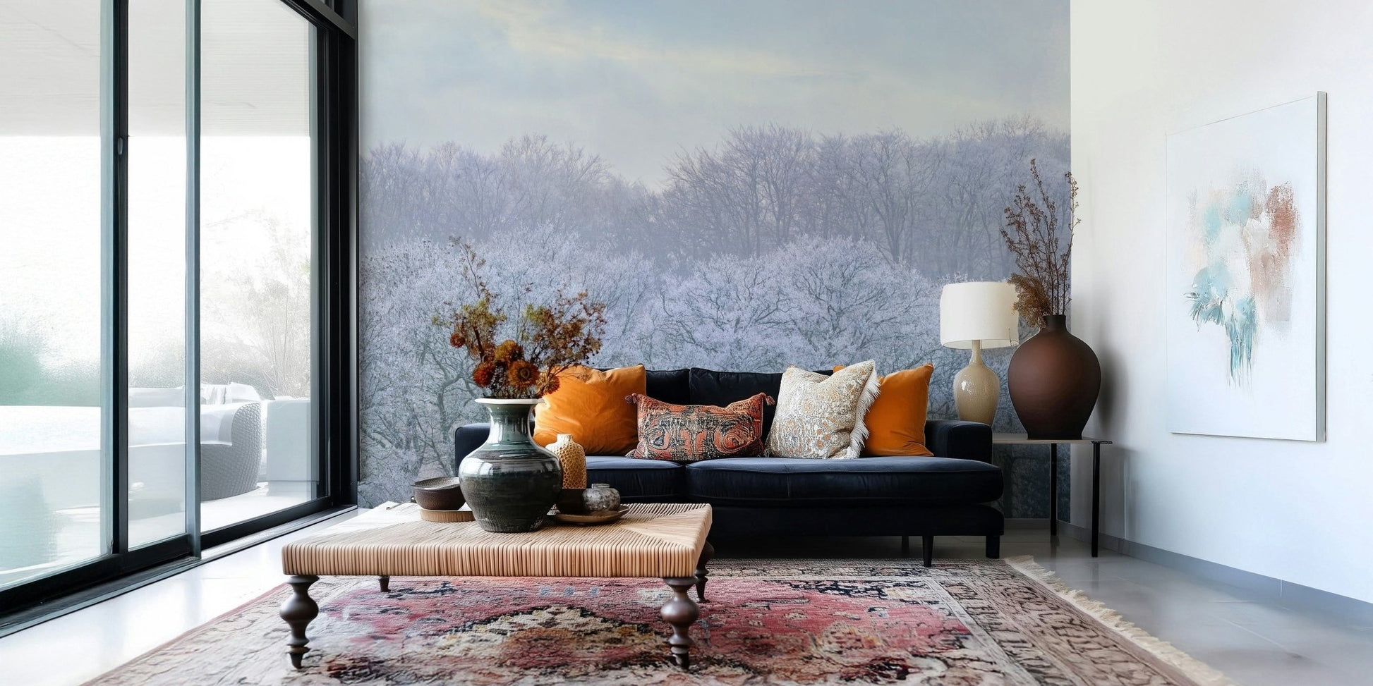 Elegant winter mural paired with contemporary furniture in an open floor plan.