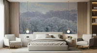 Winter's Whispers Wall Mural in a minimalist living room with neutral wooden furniture.