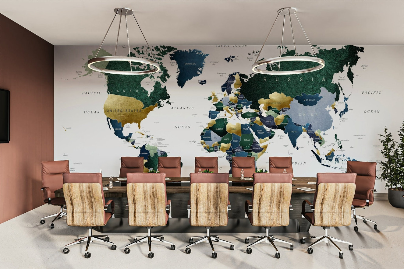 World map mural in green and blue hues

