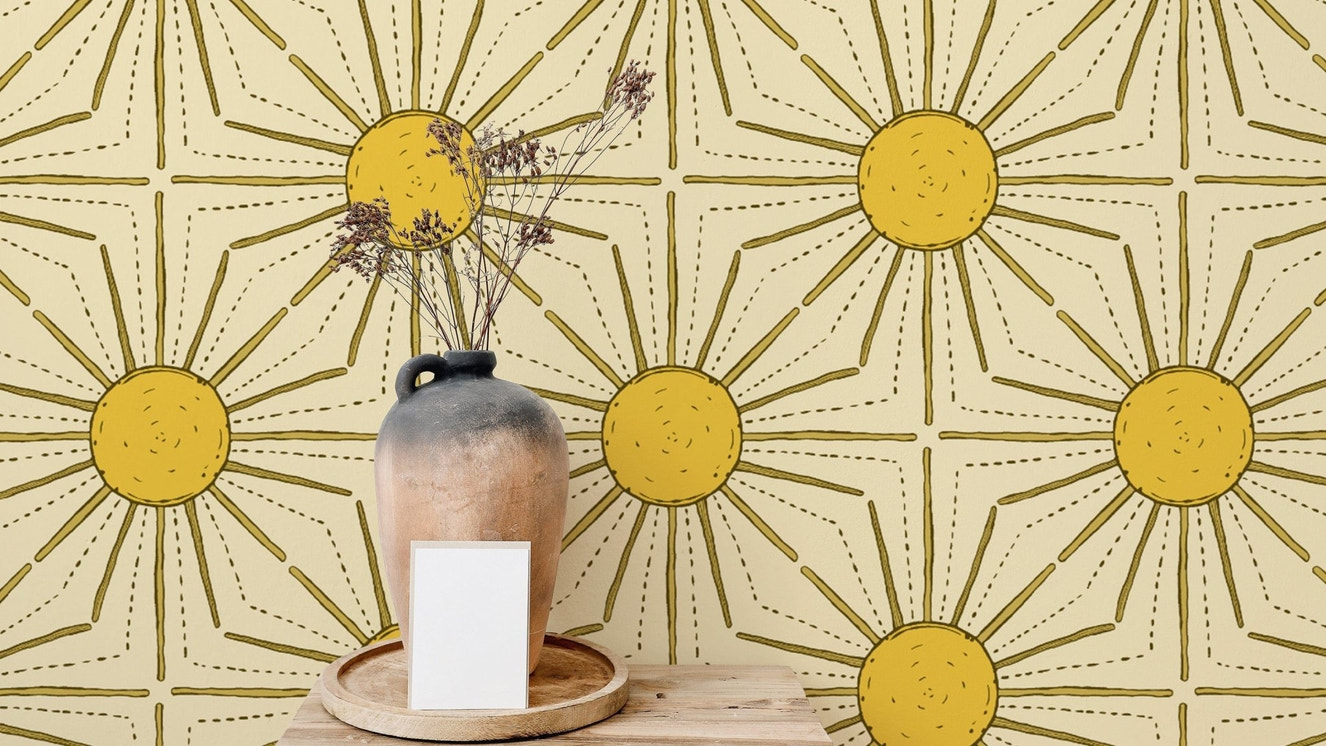 Easy-to-apply yellow sunburst peel and stick wallpaper.
