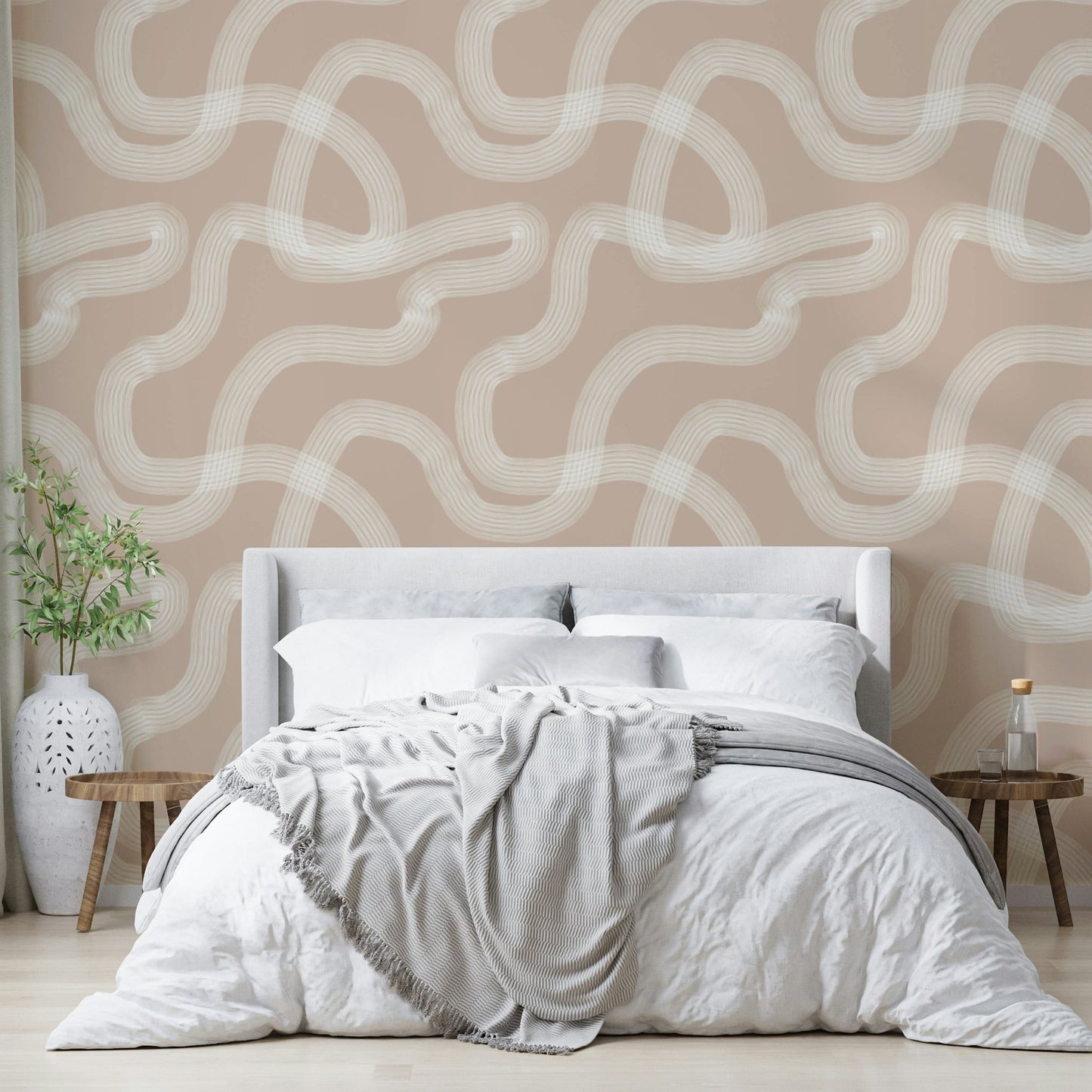 Calming beige wallpaper with subtle textured patterns.

