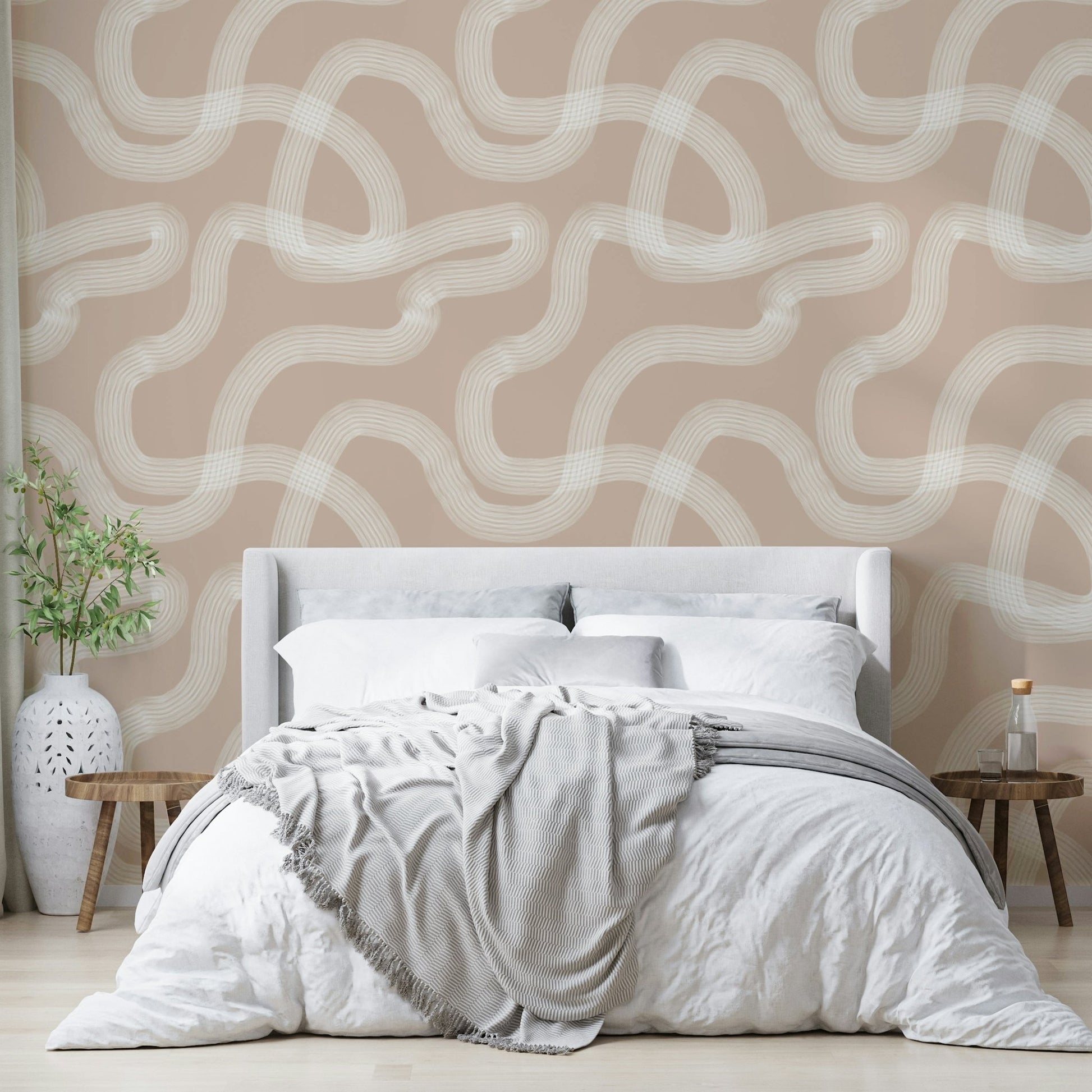 Calming beige wallpaper with subtle textured patterns.

