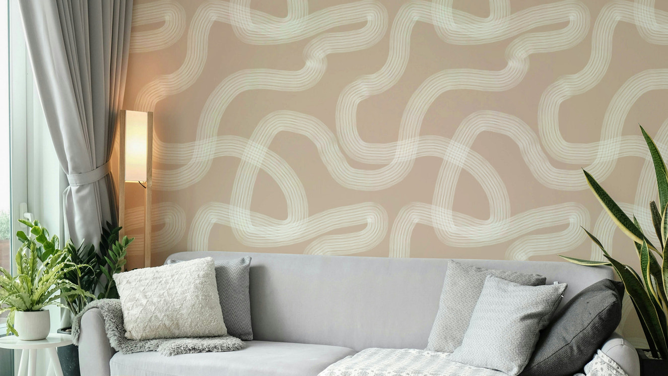 Beige wallpaper with natural flow and meditative pattern.

