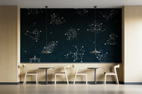 The colors are soft, muted tones of blue, purple, and gold.

